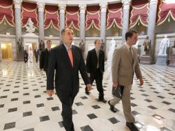 El proyecto aprobado fue impulsado por el presidente de la cámara baja, el republicano John Boehner (izq.). AP  /
