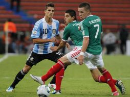 Erik Lamela (10) de los argentinso fue el verdugo del equipo mexicano. AP  /
