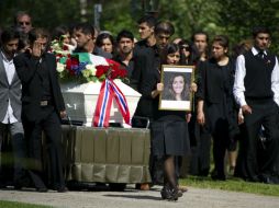 Imagen de uno de los funerales de las víctimas de la masacre. AP  /
