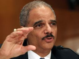 El fiscal general de EU, Eric Holder, dijo que el cumplimiento de las leyes de inmigración es una 'responsabilidad nacional'. ARCHIVO  /
