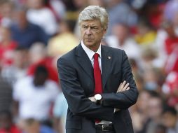 Wenger quiere que Fábregas siga con su equipo la próxima temporada. AFP  /