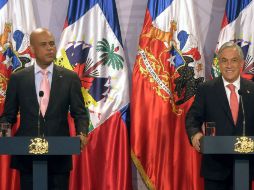 Sebastián Piñera y su homólogo haitiano, Michel Martelly, ofrecen una conferencia de prensa. NTX  /
