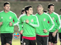 Elementos del Tricolor trotan alrededor de la cancha del Estadio El Campín. MEXSPORT  /