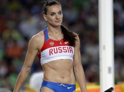 La atleta rusa Yelena Isinbayeva durante la final femenina de salto con pértiga. AP  /