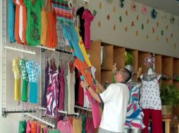 Más de 250 empresas de la industria del vestido cerraron durante el primer semestre de 2011. ARCHIVO  /