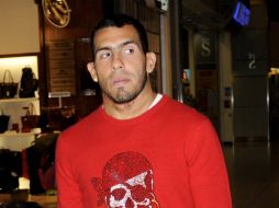 CArlos Tévez en el aeropuerto de Argentina. AP  /