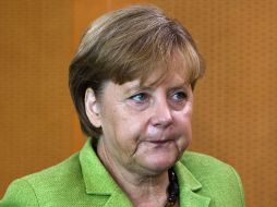Merkel afronta difíciles desafíos para planear una medida de rescate económico para Alemania. AP  /