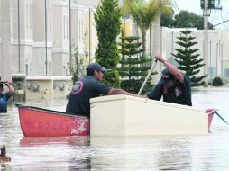 Algunos afectados se aferran a la casi nula esperanza de recuperar algunas de sus pertenencias. NTX  /