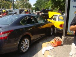 El automóvil en el que circulaba la víctima, un Nissan Altima, modelo 2010, quedó bajo resguardo de la Procuraduría Estatal. ESPECIAL  /