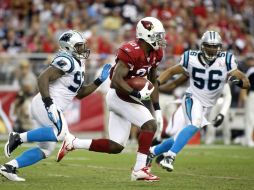 Patrick Peterson (centro) fue pieza clave en la victoria de los Cardenales. AP  /