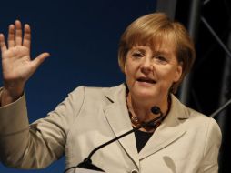 Merkel dijo que la visita del Papa era un recordatorio de las raíces cristianas en Alemania y Europa. AP  /