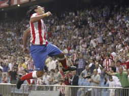El delantero colombiano del Atlético de Madrid, Radamel Falcao celebra uno de sus goles. EFE  /
