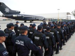 Policías federales arriban al aeropuerto tapatío, con motivo de los próximos Juegos Panamericanos. NTX  /