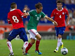 Guardado se perderá un choque con los blanquiazules para cumplir con el Tricolor. MEXSPORT  /