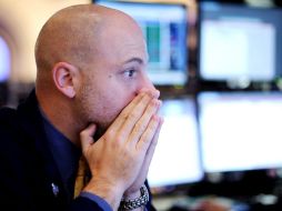 La apertura al alza de la BMV es una buena noticia para los inversores. En la foto, operador de Wall Street. EFE  /