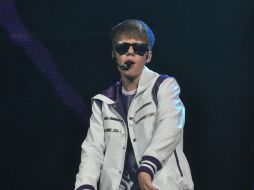 Justin pronunció el tradicional “¡Hola México!, en español, que provocó la euforia de sus fans. AFP  /