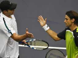 El español (d) sacó incluso mejor que Roddick, uno de los mejores bombarderos del circuito. AP  /