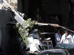 Uno de los pilotos que sobrevivió al accidente del helicóptero en el DF pagó 400 mil pesos para no ser detenido, aún es investigado.  /