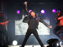 Por casi dos horas, el público jarocho coreó y bailó las canciones de Martin. EFE  /