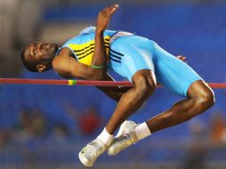 Thomas, durante la realización de su espectacular salto. AFP  /