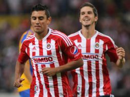 Las Chivas llegan como líderes del torneo al Clásico ante los rojinegros. NTX  /