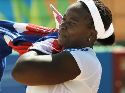 Barrios se corona con nuevo récord y oro. AFP  /