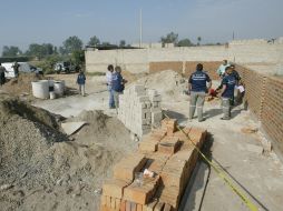 La víctima el rostro cubierto con un pedazo de tela roja y presentaba varios balazos. ARCHIVO  /