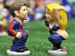 Estas figuritas son un símbolo de prosperidad y buena suerte para el próximo año. EFE  /