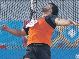 Fernando del Rosario ganó la medalla de oro en lanzamiento de disco F5758. MEXSPORT  /
