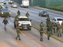 Esta mañana, corporaciones municipales, estatales y el Ejército se coordinaron en el operativo de seguridad en los Arcos del Milenio.  /