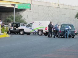 El pasado jueves, policías localizaron 26 cadáveres en tres camionetas abandonadas en las inmediaciones de los Arcos del Milenio.  /