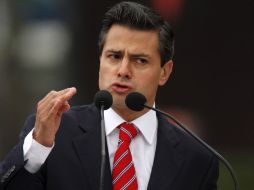 El aspirante priista dijo que Calderón tiene una enorme responsabilidad de combatir a la delincuencia organizada. AP  /