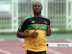 Powell afrontará un duro desafío contra sus compatriotas Usain Bolt y Yohan Blake. MEXSPORT  /