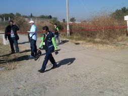 Personal del Instituto Jalisciense de Ciencias forenses realizan estudios de campo.  /