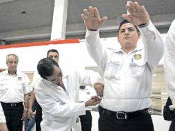 El Sistema Nacional de Seguridad Pública revela que el índice promedio de reprobación entre policías es de 50%. EL UNIVERSAL  /