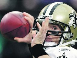 Drew Brees lanzó para cinco pases de touchdown y completó 32 de 40 pases en la paliza de los Santos 42-20 a los Vikingos. AP  /