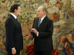 Mariano Rajoy presidente del Gobierno del Reino de España jura su cargo ante los reyes de España Juan Carlos y Sofía. NOTIMEX  /