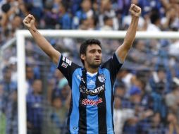 Carlos Bueno festeja una de sus 21 anotaciones de este año. MEXSPORT  /