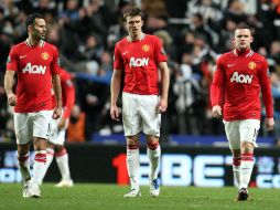 Los jugadores del Manchester United no supieron reaccionar en el partido. AP  /