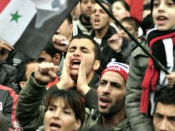 Los partidarios del presidente sirio, Bashar al-Assad se manifiestan en el centro de Damasco. AFP  /