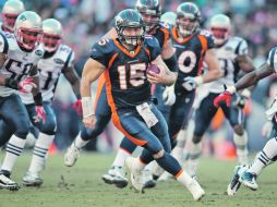Tim Tebow (15), de los Broncos, ya enfrentó esta temporada a los Patriotas de Nueva Inglaterra en la Semana 15. GETTY IMAGES SPORT  /