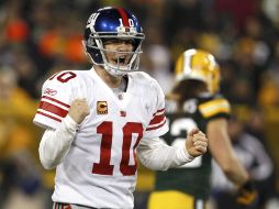 Eli Manning mete de nuevo a los Gigantes a la final de conferencia. REUTERS  /