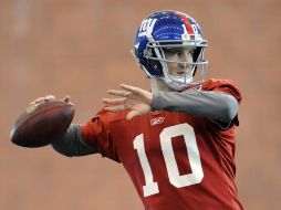 Eli Manning es favorito para llevar a los Gigantes al juego final de la NFL. AP  /