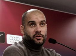 Josep Guardiola, durante la conferencia de prensa tras el entrenamiento en las instalaciones del club azulgrana. EFE  /