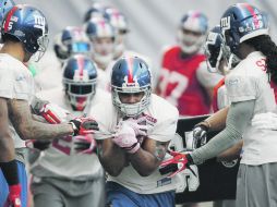 El jugador de los Gigantes, Ahmad Bradshaw, formó parte de la práctica del equipo este miércoles. AP  /