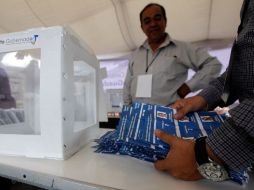 La participación de 116 mil votantes rebasó la expectativa, reflejando desorganización en los centros.  /