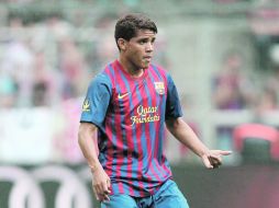 El volante mexicano jugó el sábado, ante la Real Sociedad, su tercer partido como titular con el primer equipo del Barcelona. MEXSPORT  /