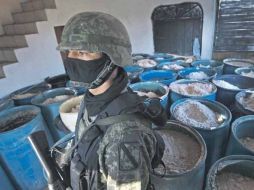 Así lucía el material para la elaboración de droga asegurado por personal militar. AP  /