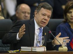 El presidente de Colombia Juan Manuel Santos dijo que con la cantidad de asesinatos se cierra la puerta al diálogo. ARCHIVO  /