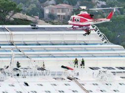 Autoridades siguen en busca de cuerpos. EFE  /